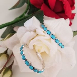Turquoise gemstone hoops set in Silver.